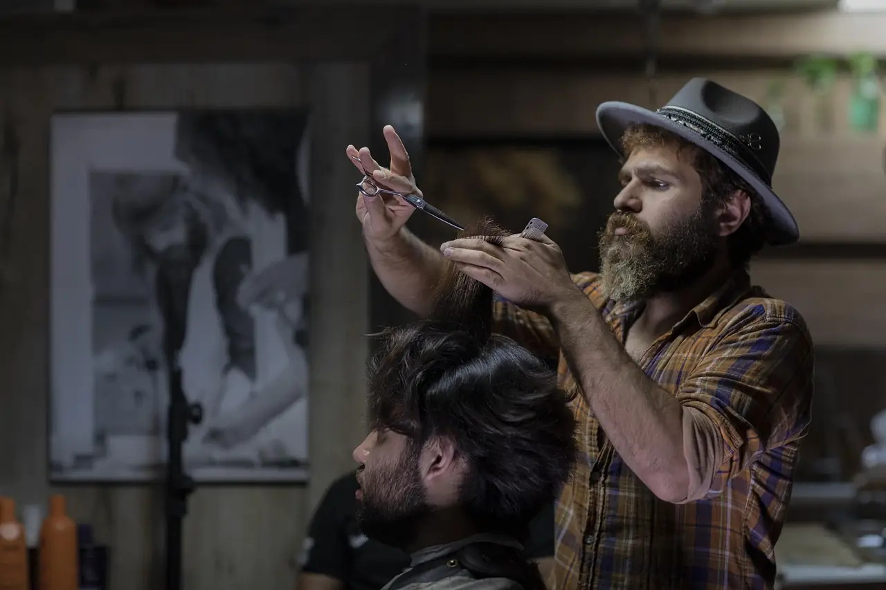 A barber with his client